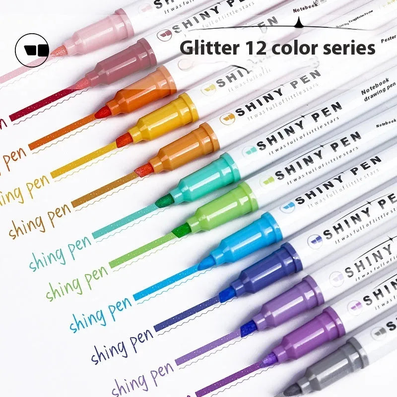 Four glitter highlighter pens with pastel colours and slanted tips on a notebook.