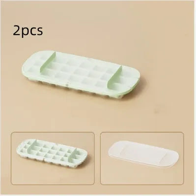 Colourful ice cube tray with grid design and integrated ice shovel storage compartment