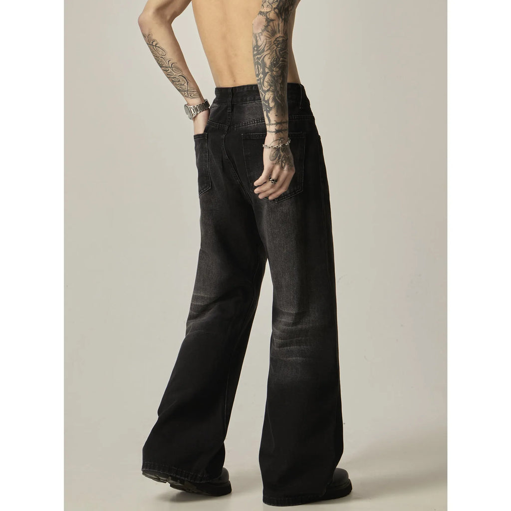 Black loose straight cut retro jeans with zipper fly on mannequin showing full silhouette