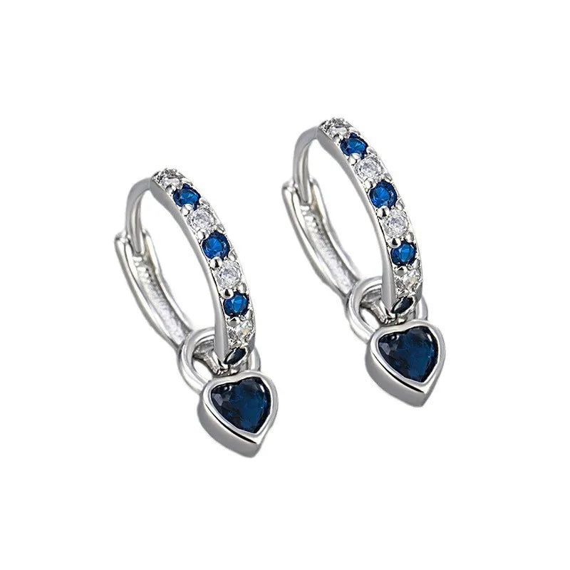 Women's copper earrings with heart-shaped drops and coloured stone accents in gold or white gold tone settings