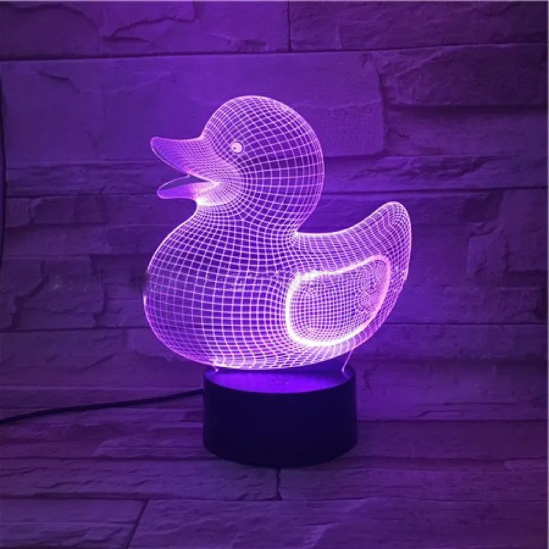 Little Yellow Duck 3D night light with acrylic panel on ABS base, showing remote control and USB cable.