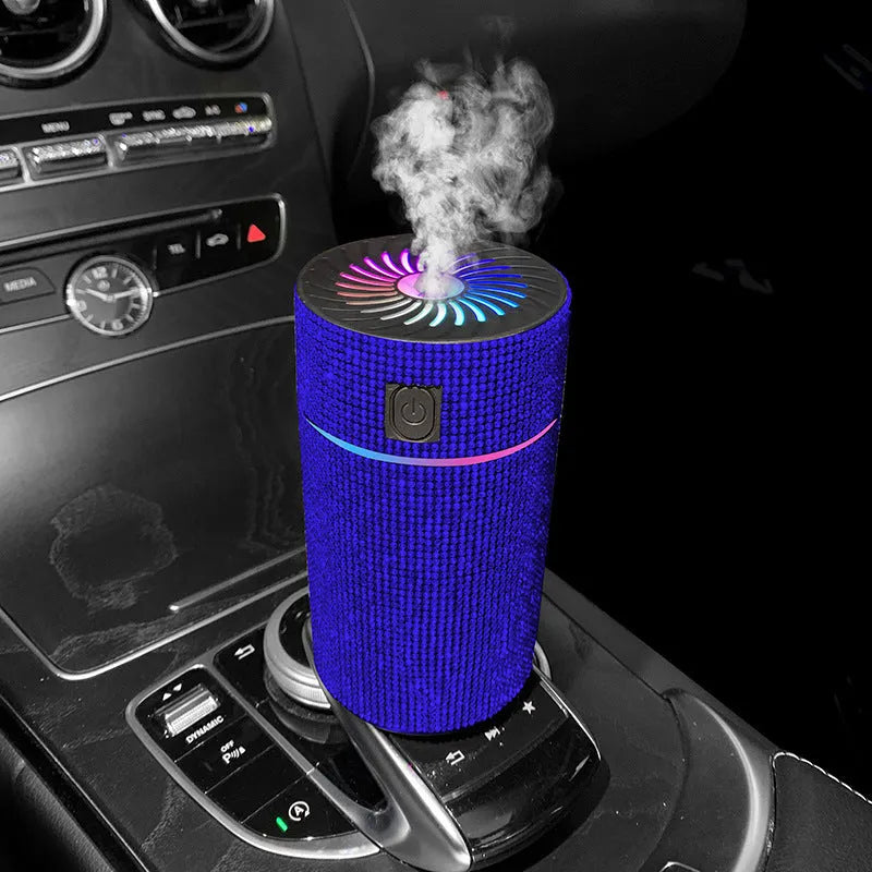 Car USB air humidifier in diamond finish colours on vehicle dashboard
