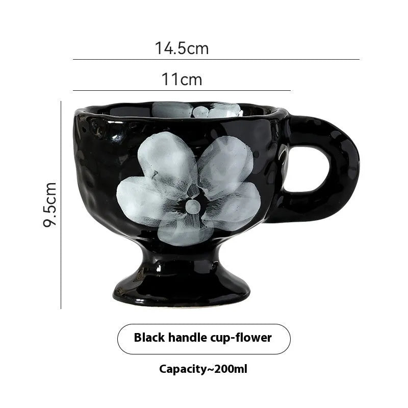 Hand-pinched irregular ceramic mug with solid colour design, approximately 14.5cm tall