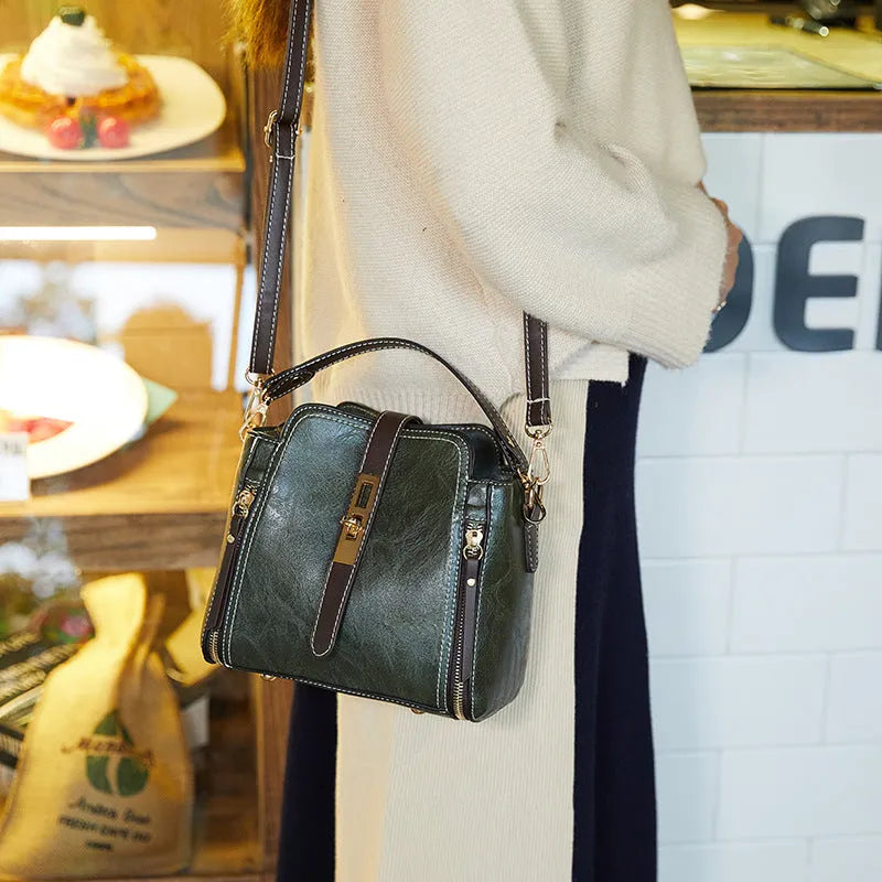 Faux leather women shoulder bag in green with detachable adjustable strap and turn-lock closure