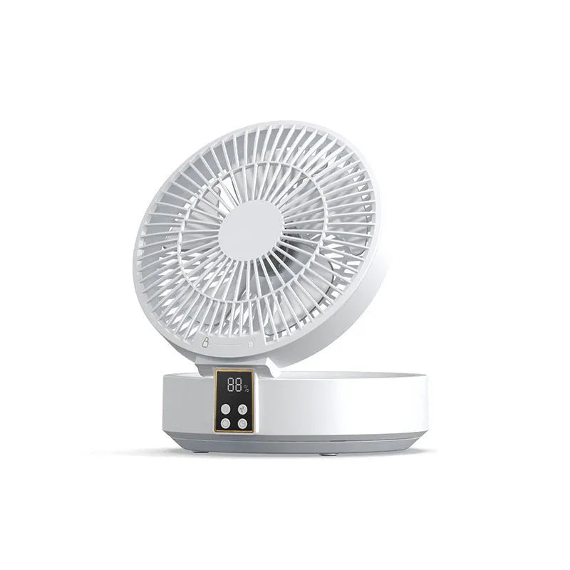 White portable USB rechargeable folding ceiling fan with remote control on desk