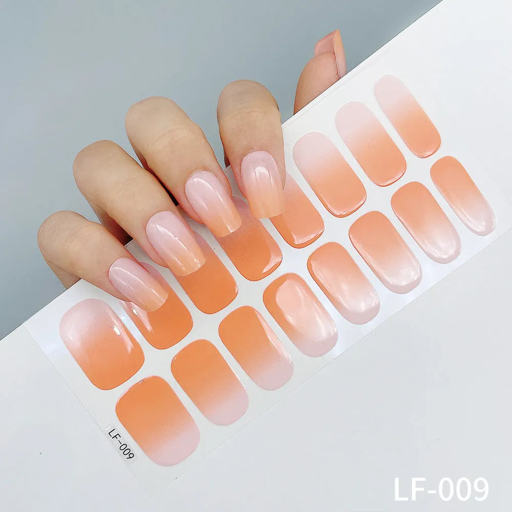 Full nail art sticker sheet showing 16 different solid colour designs including European simple nails and floral patterns