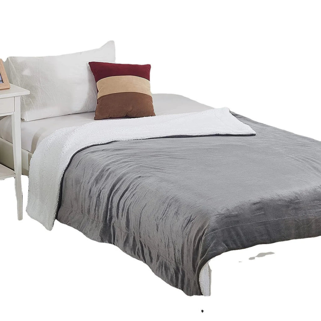 Grey flannel electric heating blanket with USB connection showing temperature controls