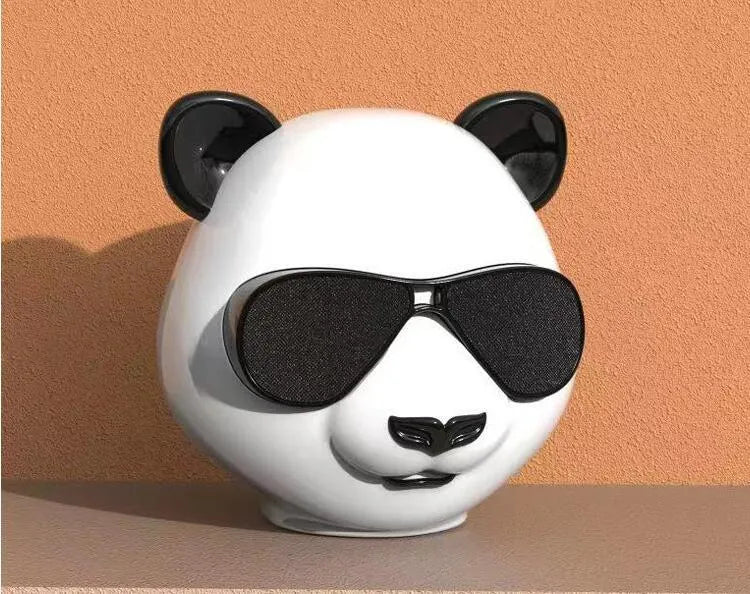 Portable mini Bluetooth speaker with classic style design showing USB charging port