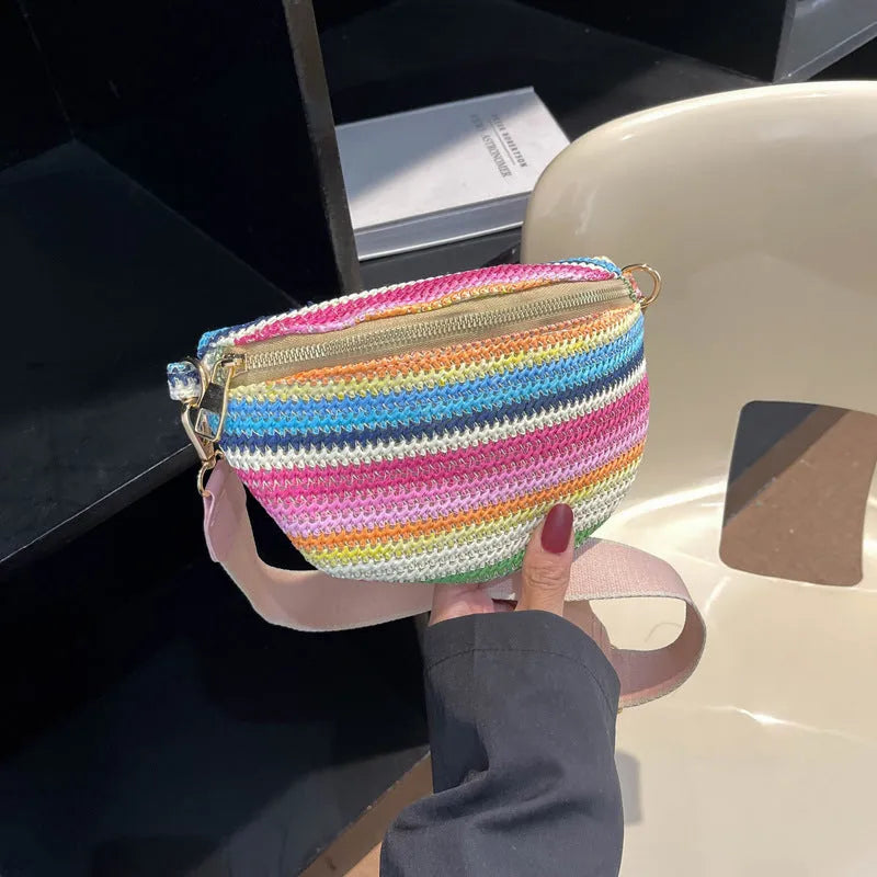 Women's woven straw beach bag in bohemian style, available in pink or blue colour with single shoulder strap
