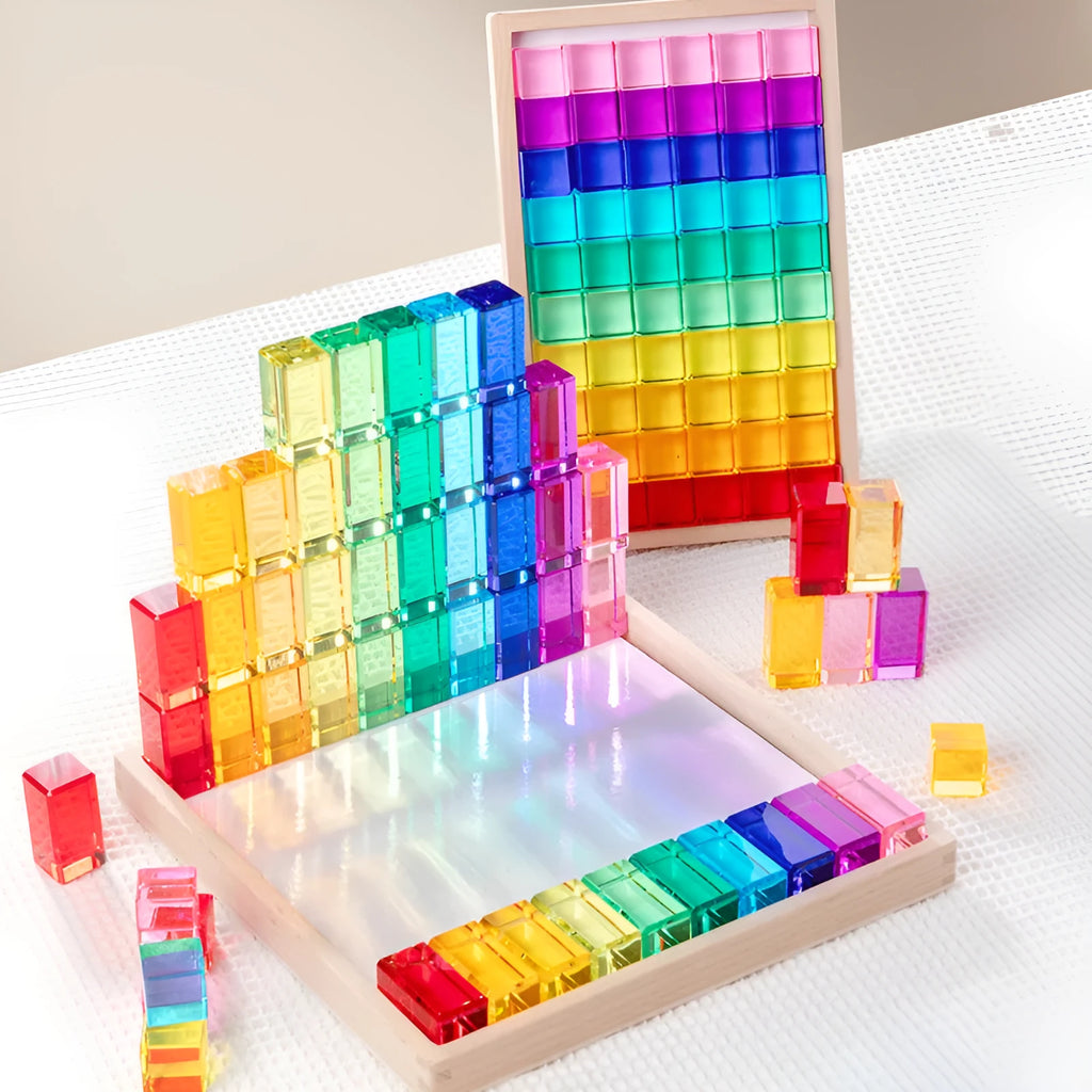 Wooden building block set with clear acrylic high permeability tiles on a tray, 29cm square