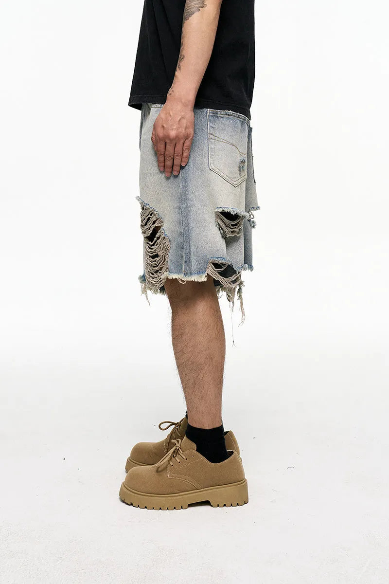 Men's light blue baggy denim shorts with wide leg retro washed design