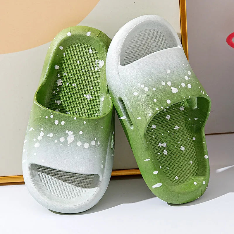 Gradient coloured PVC summer slippers for children on a non-slip sole.