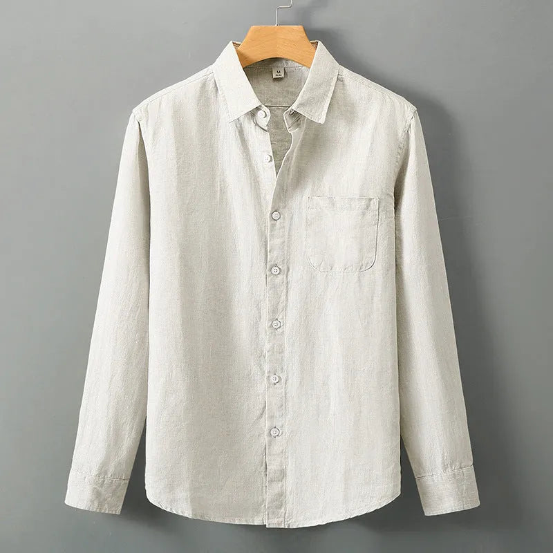 Long sleeve loose fit linen shirt in a solid colour, styled as a Chinese cardigan.