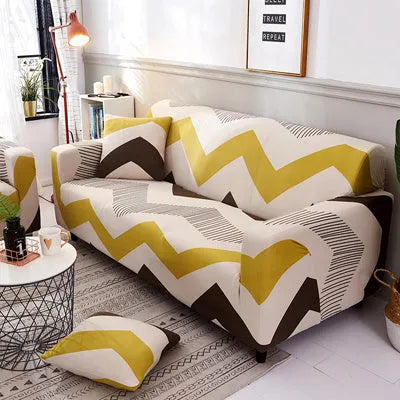 Geometric print polyester sofa slipcover stretched over sofa with matching pillowcase