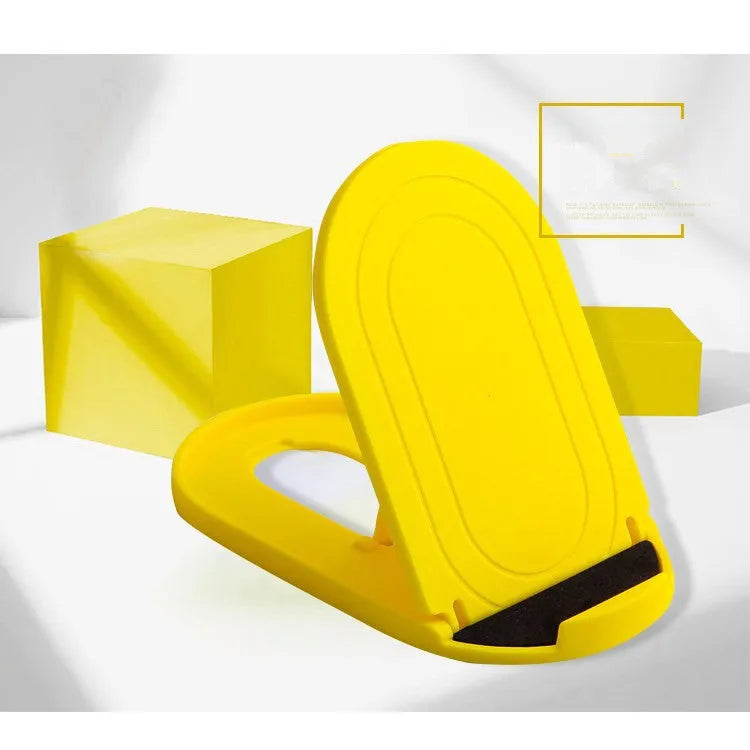 Plastic lazy bracket mobile phone stand in six colour options on a desk.