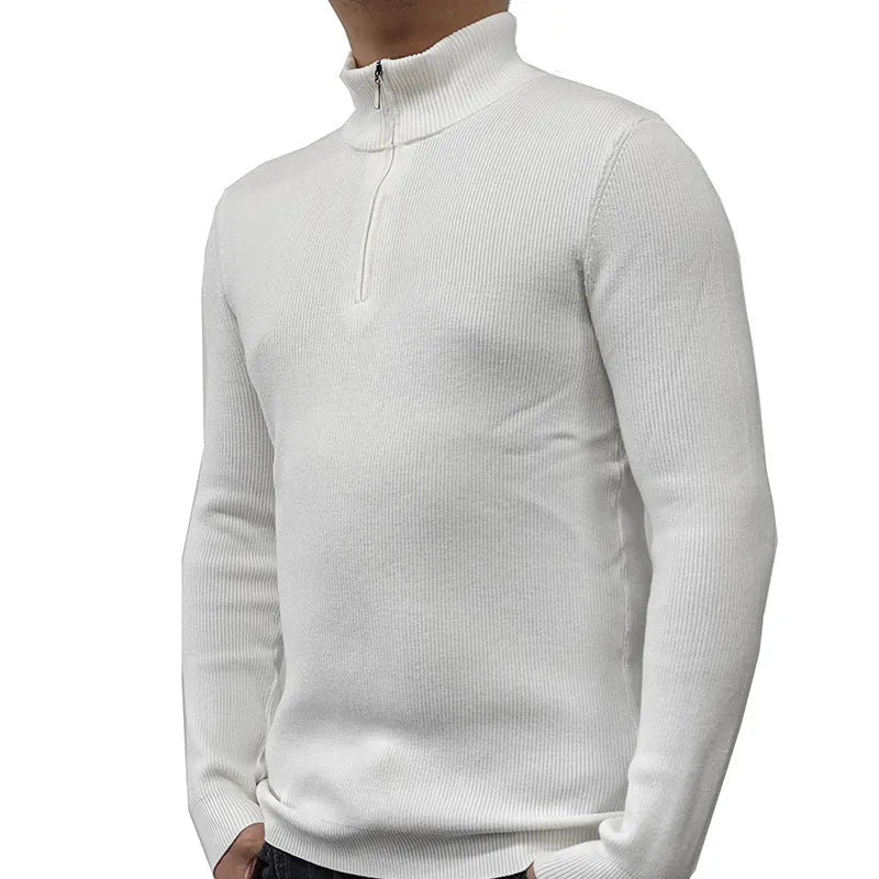 Man wearing a grey half-turtleneck zipper sweater, a cotton blend pullover for casual wear.