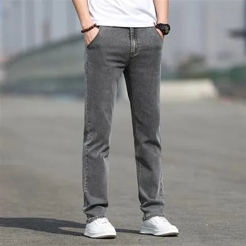 Men's straight leg jeans in smoky grey colour with a low waist and zipper fly