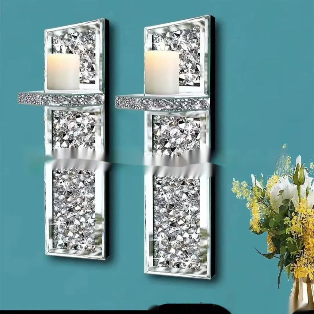 Pair of modern silver mirror glass wall-mounted candle holders, 38cm tall.