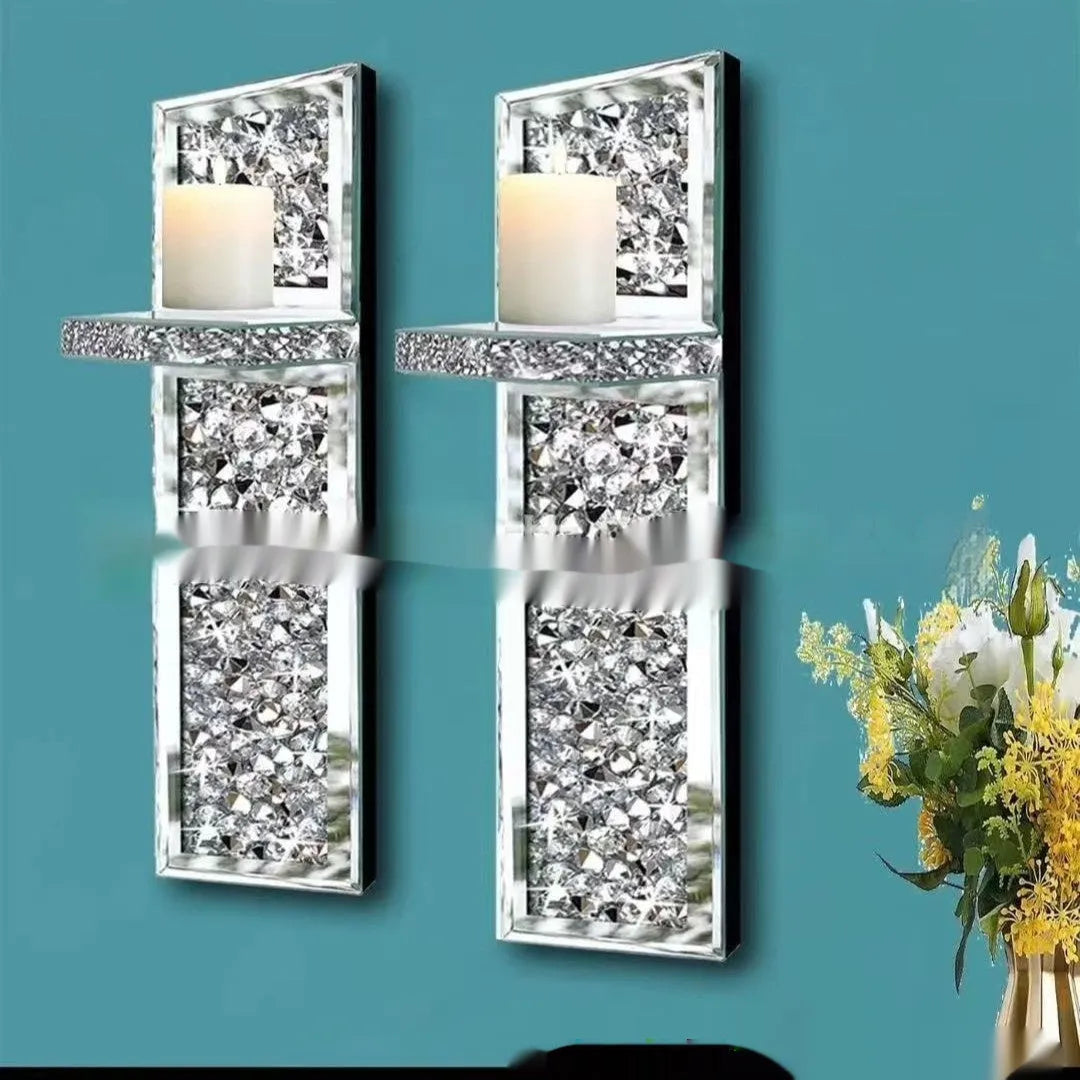 Pair of modern silver mirror glass wall-mounted candle holders, 38cm tall.
