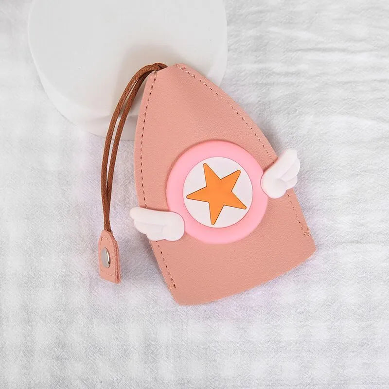 Cartoon pull-out key case in PU leather showing design options including resin fruit and big cartoon animal prints.