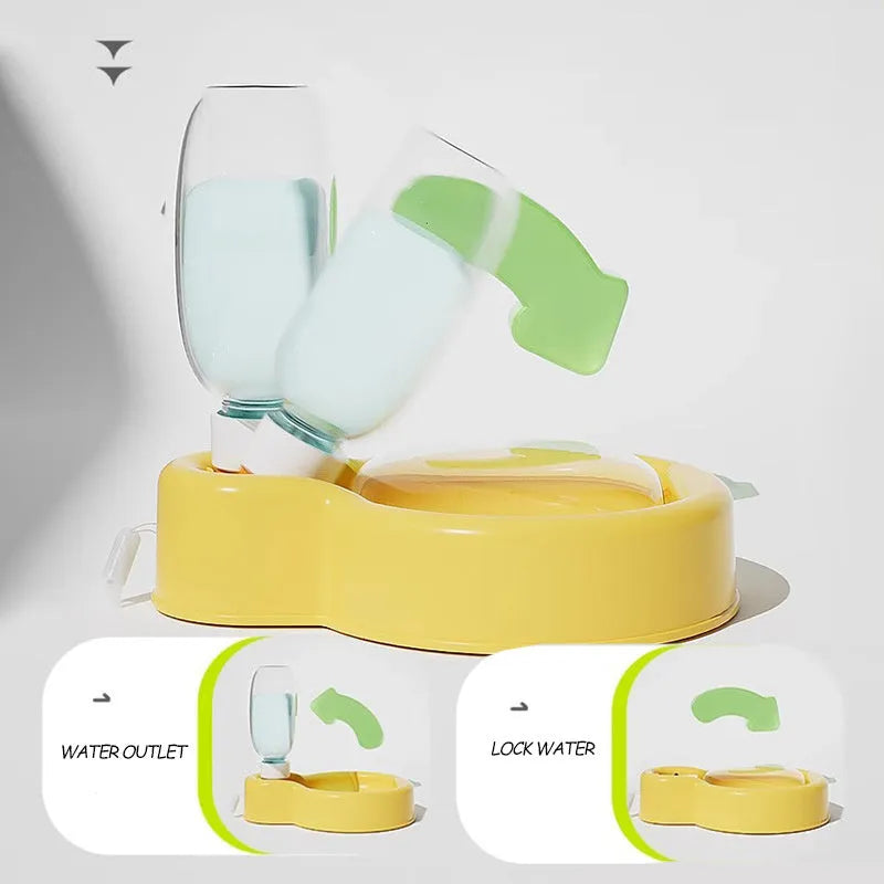 Green portable pet travel cup with extended drinking bowl and water bottle handle.