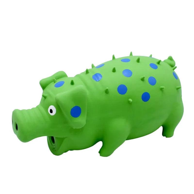 Colourful pig-shaped latex dog chew toy with textured surface for teeth cleaning