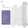Set of four silver metal acne needles with pointed tips on a white background.