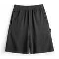 Cement grey straight-leg men's sport shorts with elastic waistband and loose fit