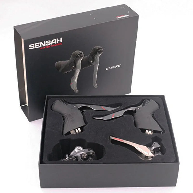 Road bike transmission kit showing aluminium alloy manual shifter, front derailleur and short-leg rear derailleur components