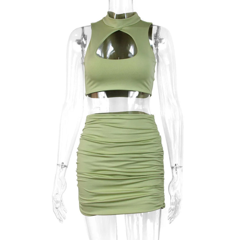 Women's light purple summer two-piece set with hollow vest top and matching hip skirt