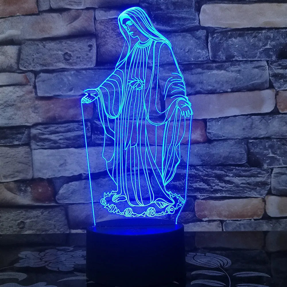 3D LED night light showing illuminated blue dual-ring pattern on acrylic plate with black ABS base.