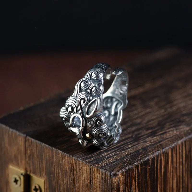 Silver open ring with detailed Jibeast animal pattern and retro styling