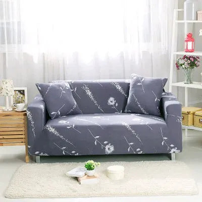 Geometric print polyester sofa slipcover stretched over sofa with matching pillowcase