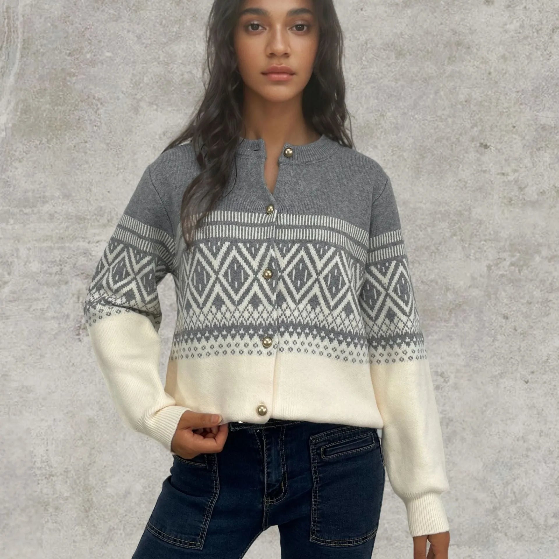 Women's red alpaca wool cardigan with grey diamond knit pattern and long sleeves