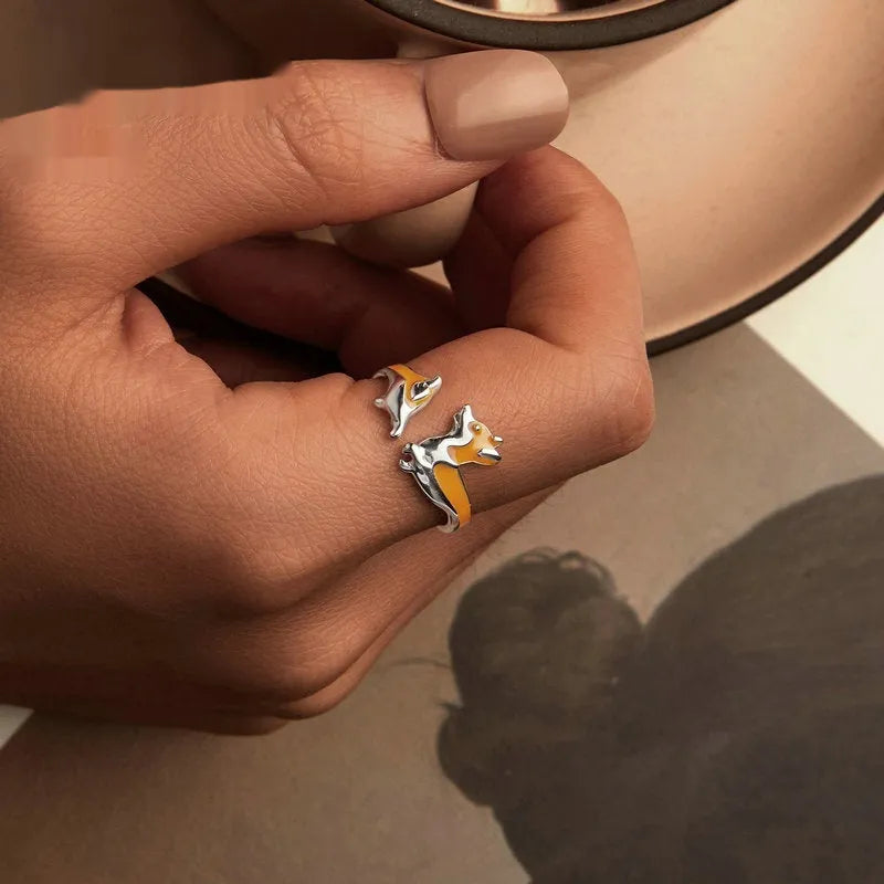 Adjustable silver-plated ring featuring a cartoon sitting corgi dog design.