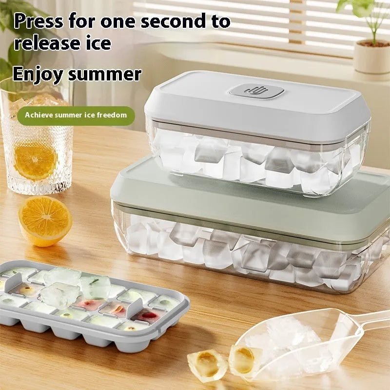 32 grid ice cube tray with press button demould and white spatula on blue background