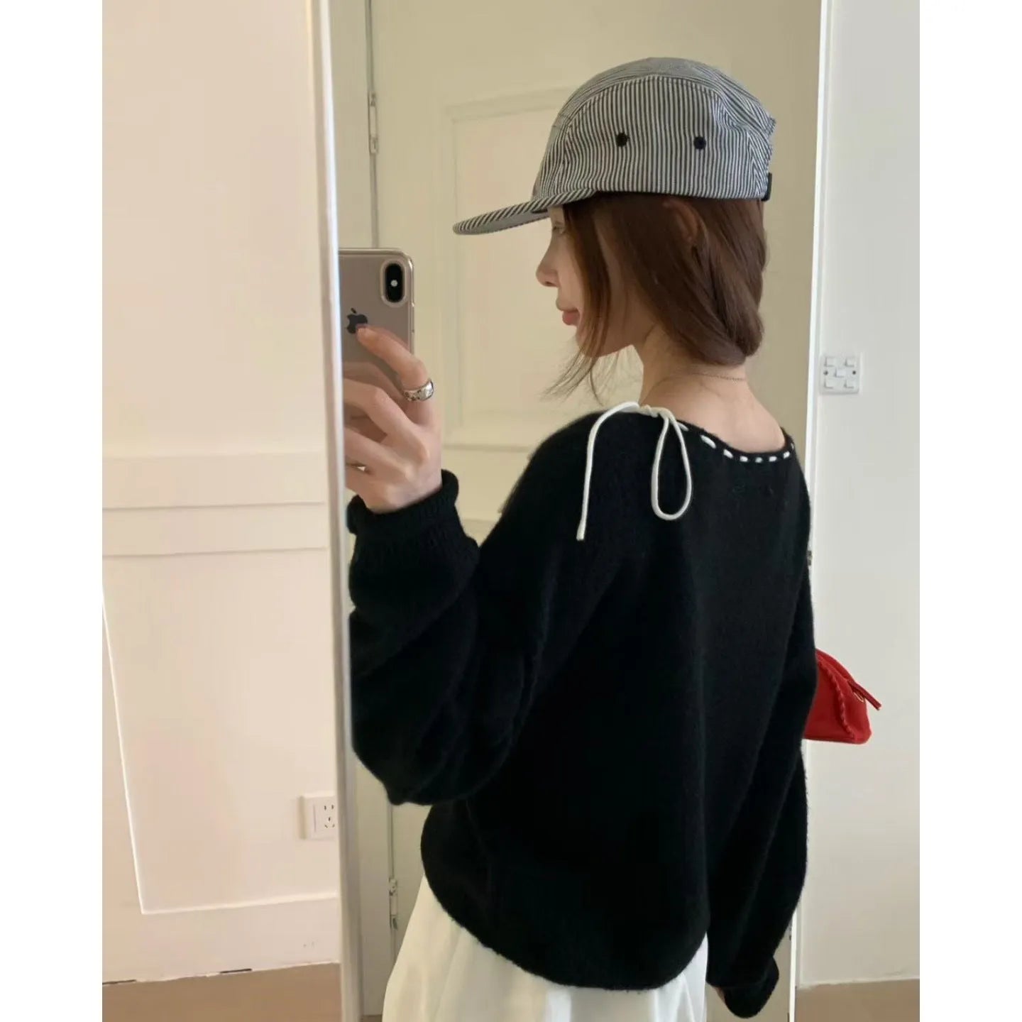 Women's loose-fitting knitwear pullover jumper in black and grey colours made from regenerated cellulose fibre