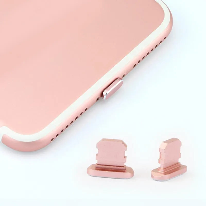 Aluminium alloy dust plug for iPhone charging port in various colours including gold, silver, and rose gold.