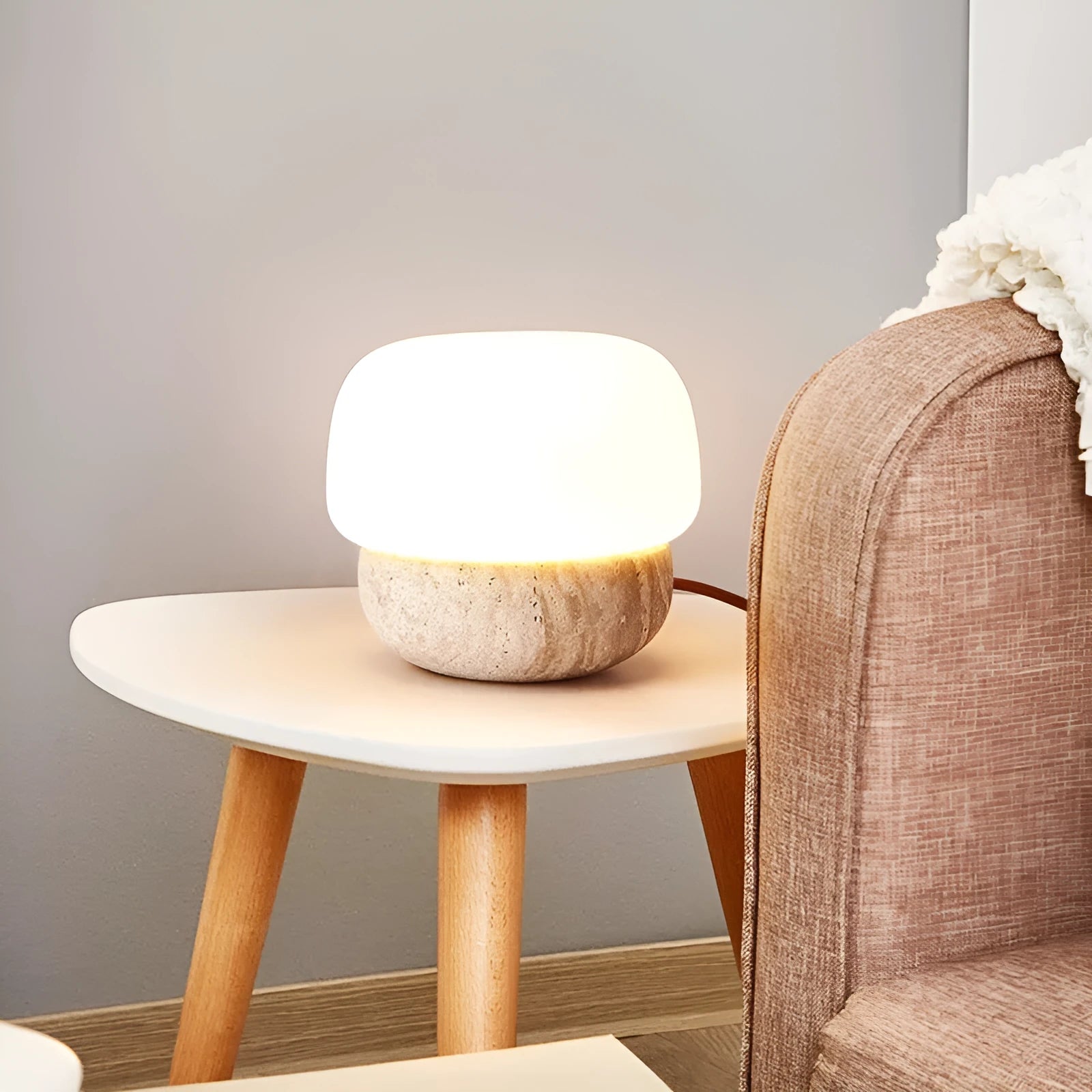 Cream coloured retro bedside lamp measuring 18x17cm with button switch and warm bulb illumination
