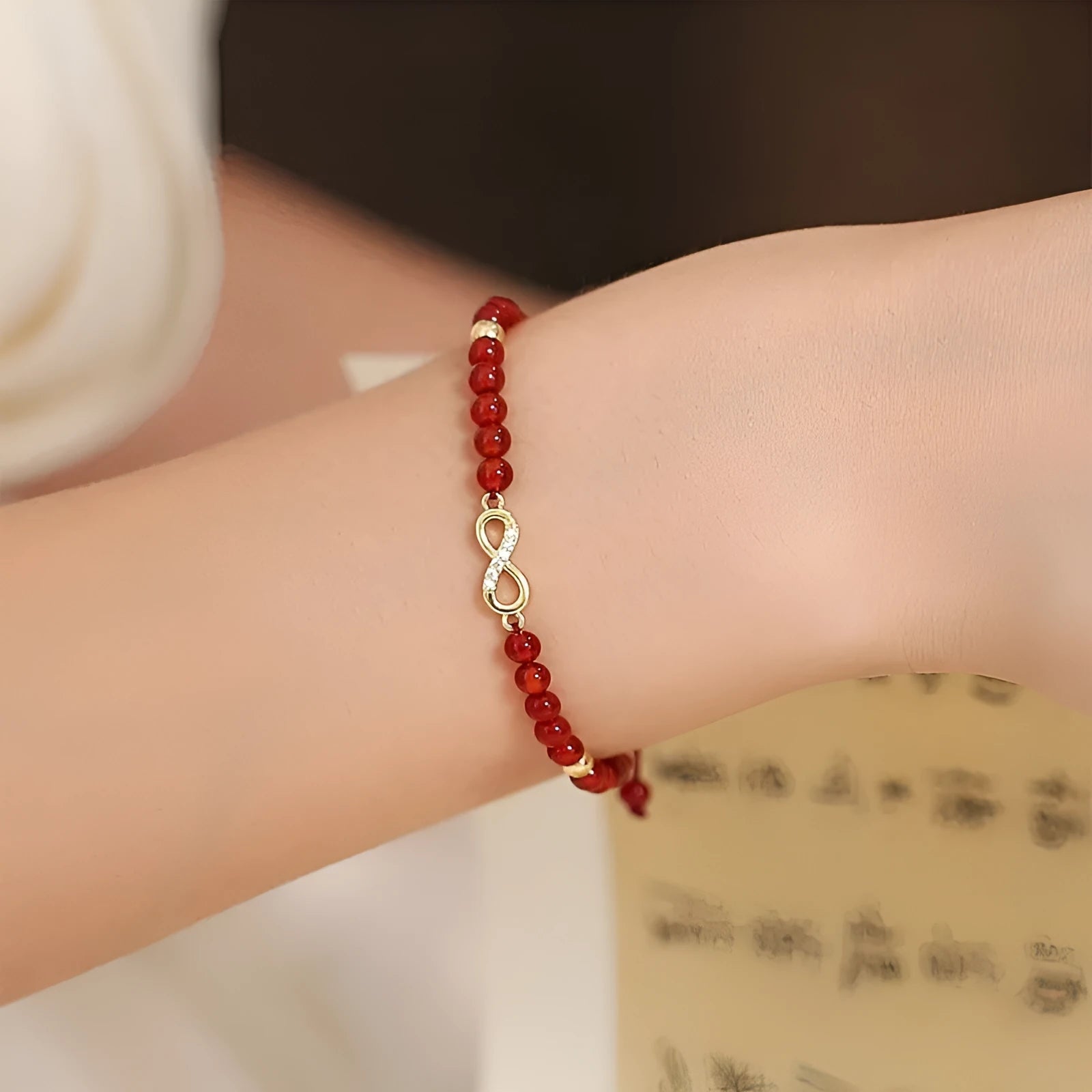 Hand-woven red agate beads bracelet with diamond-shaped arrangements in ethnic style design