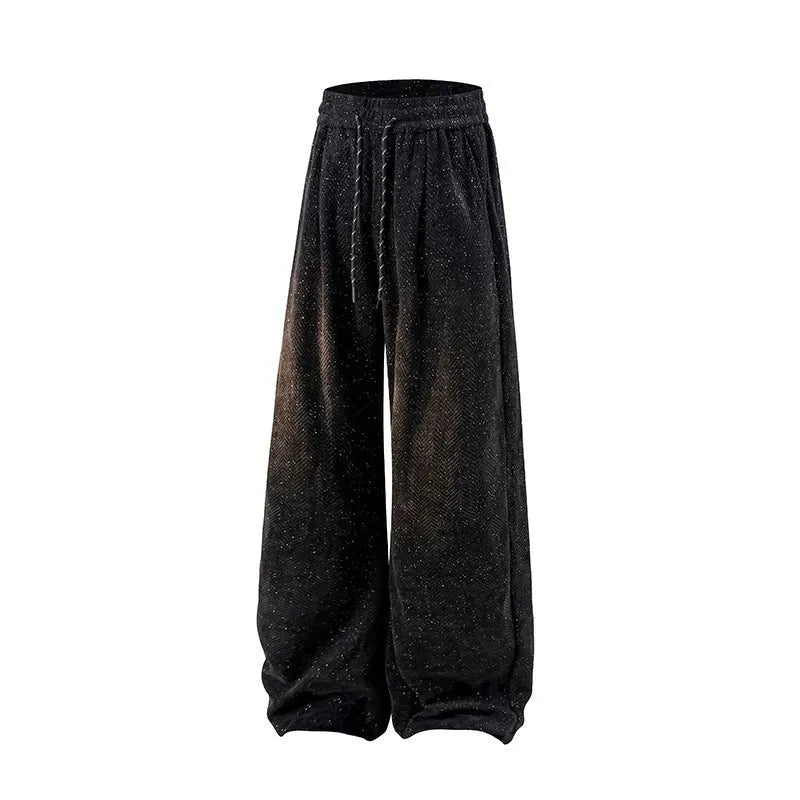 Fleece-lined straight-leg hollow-out trousers in light gray on a hanger, showing elastic waistband and textured fabric.