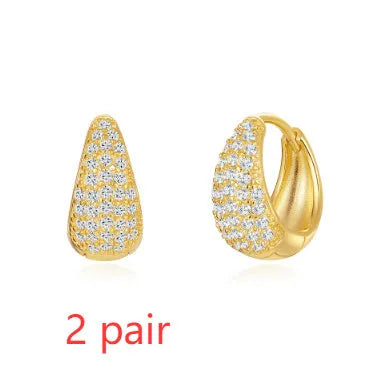 Gold electroplated brass earclip earrings with geometric round design in three style options