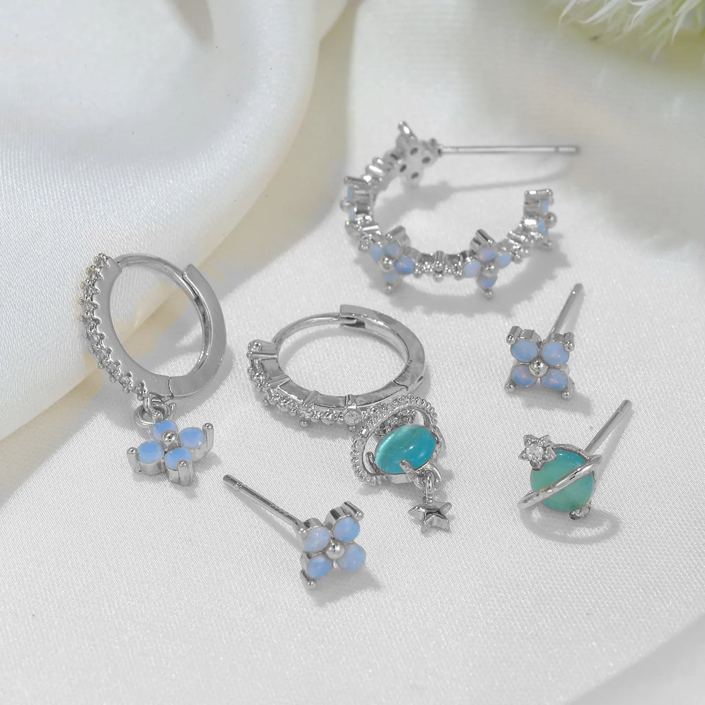 Gold or silver flower ear studs with zircon mosaic centre detail geometric design