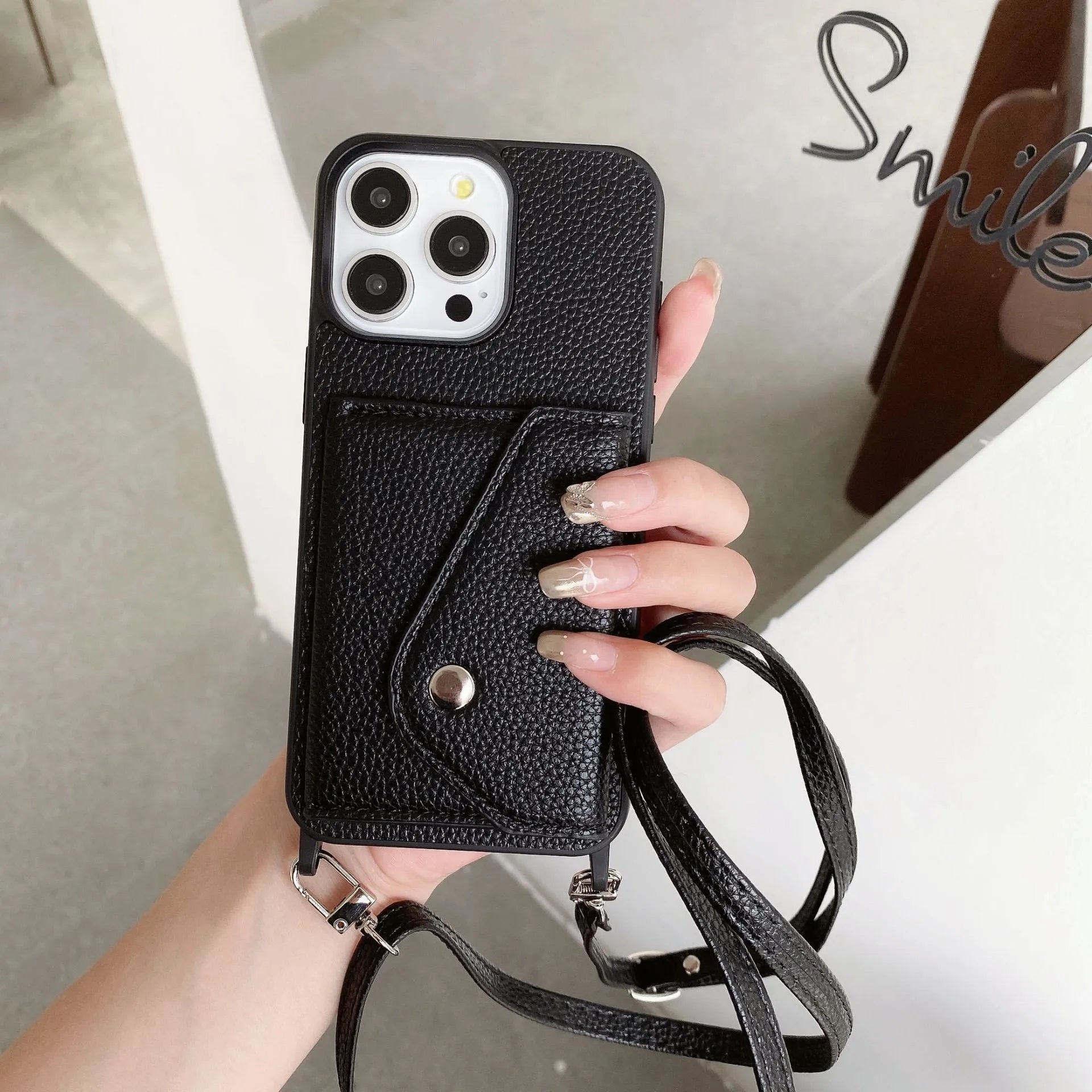 Lychee pattern imitation leather phone case with crossbody strap and triangle card holder for iPhone 14