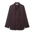 Brown women's loose fit poplin shirt with long sleeves and a scarf bow tie detail.