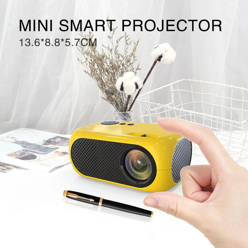 M24 micro mini projector in gold or white colour with power adapter and AV cable