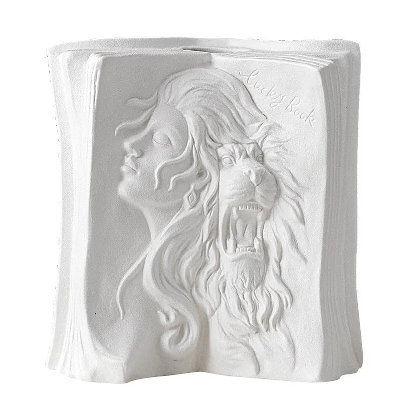 Ceramic book stand with glazed finish in one of four artistic designs on a desk.