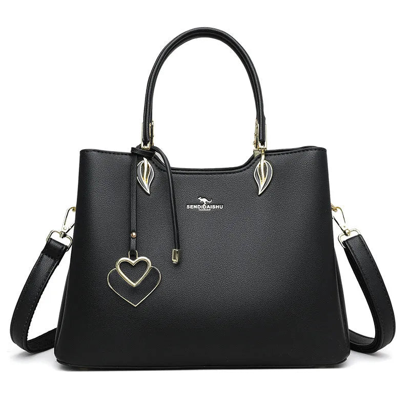 Women's black PU leather shoulder messenger bag with multi-layer compartments and visible stitching details