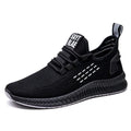 Men's black sports shoes with flying three bars pattern and cross strap detail on low-top design