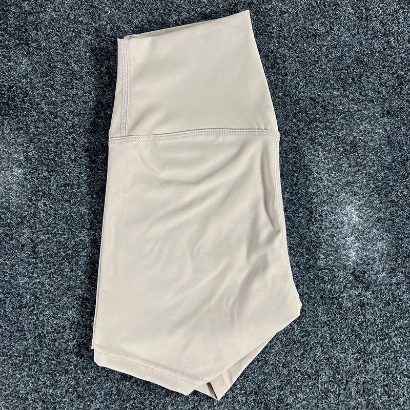 Women's high-waist yoga shorts in nylon fabric for running, sports, and cycling activities